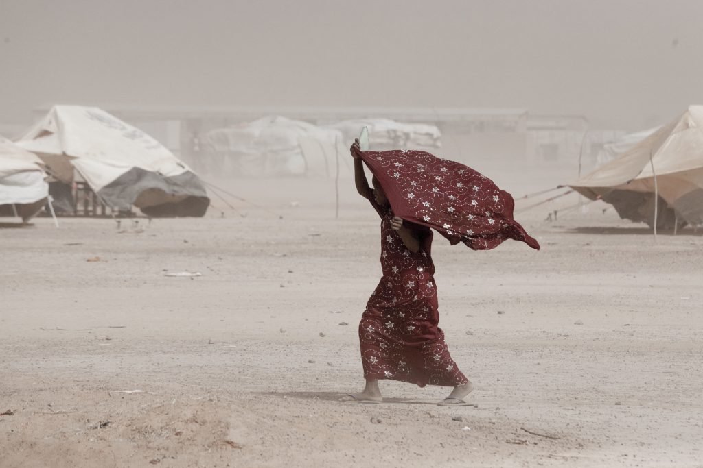 coronavirus-in-africa-woman-walking.jpg-1024x683