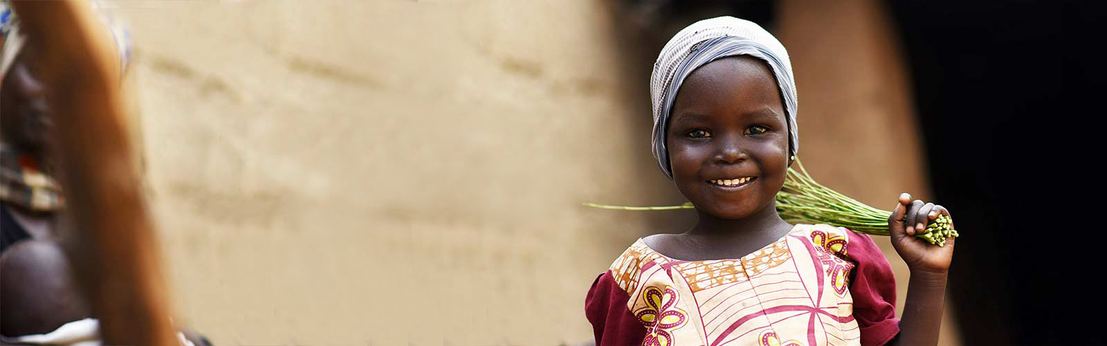 Smiling girl at her home in Maiduguri IDP camp 