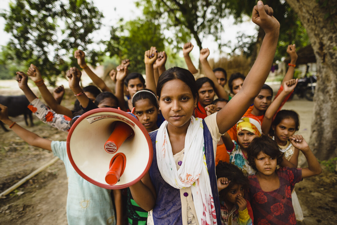 Shalini, 21, looking at the camera, is advocating for the end of child marriage in Uttar Pradesh