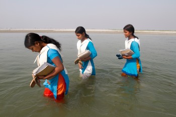 hatibandha-girls-walking-through-water-350x233