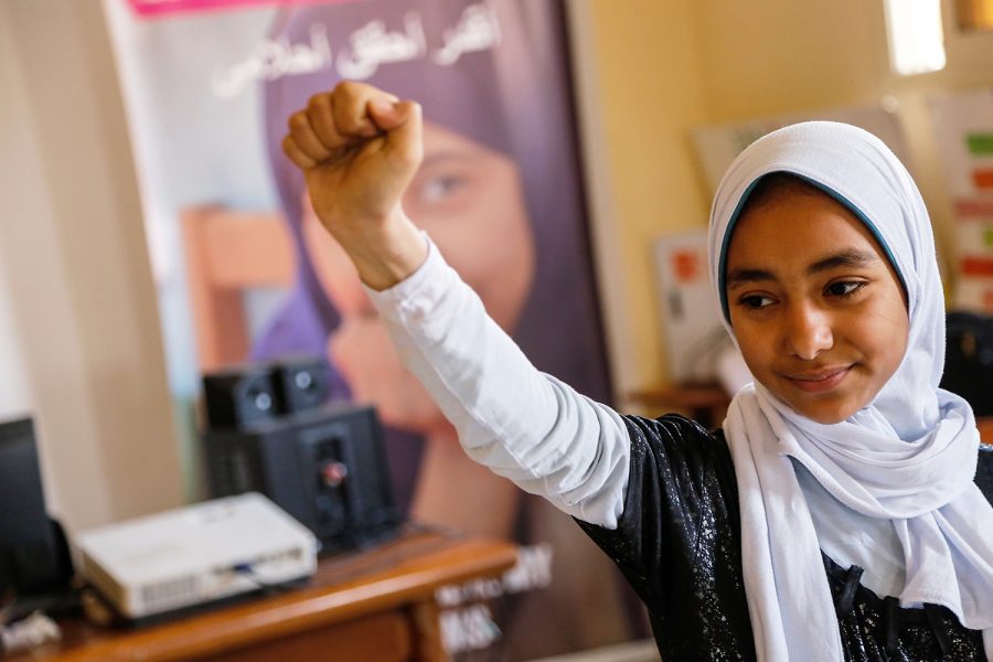 Soaad, 14, practicing self-defence moves at the community development association