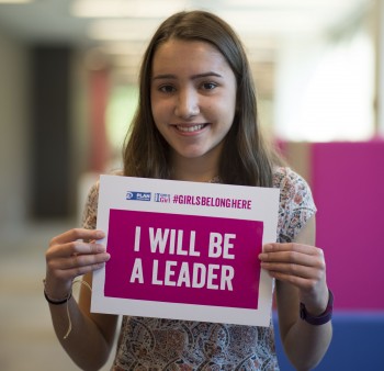 Youth holding sign saying I will be a Leader