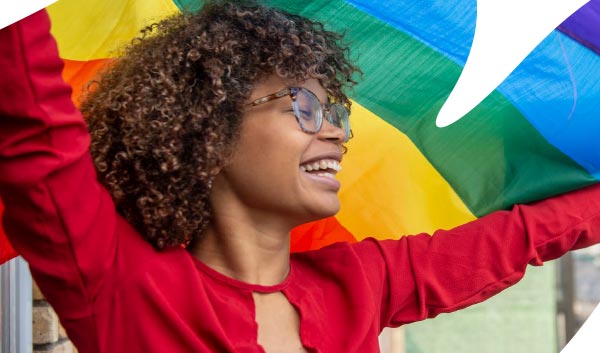 Women holding pride flag