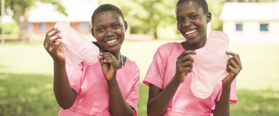 Pads for periods - GOH Product photo, Girls at school in Tororo show off their reusable sanitary pads