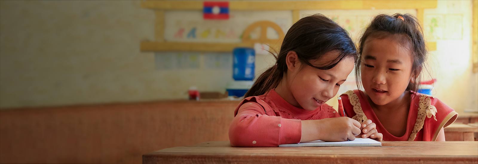 Lao and her friend studying at school
